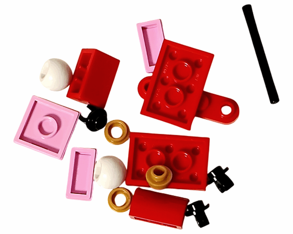 LEGO Friends 42668 アドベントカレンダー 3日目のパーツ一覧。赤とピンクのブロック、白い丸パーツ、黒いバーなど。