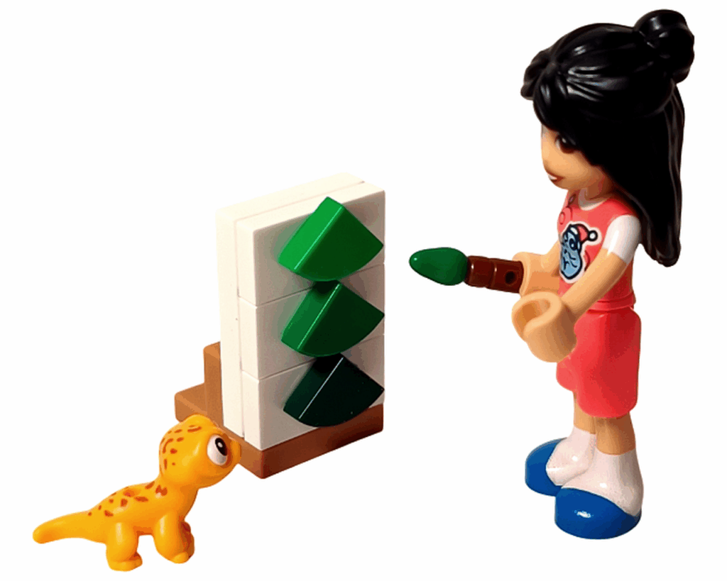 LEGO Friends 42668 クリスマスツリーの絵のアトリエセット。キャンバスと筆、カップ、ペイントポットが並ぶ。
