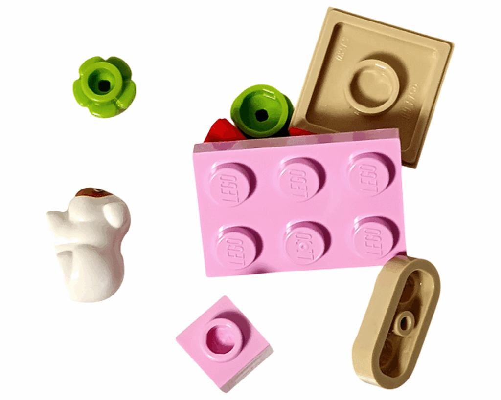 LEGO Friends 42668 17日目のパーツ一覧。白いモルモット、ピンクとベージュのブロック、グリーンの花パーツなど。